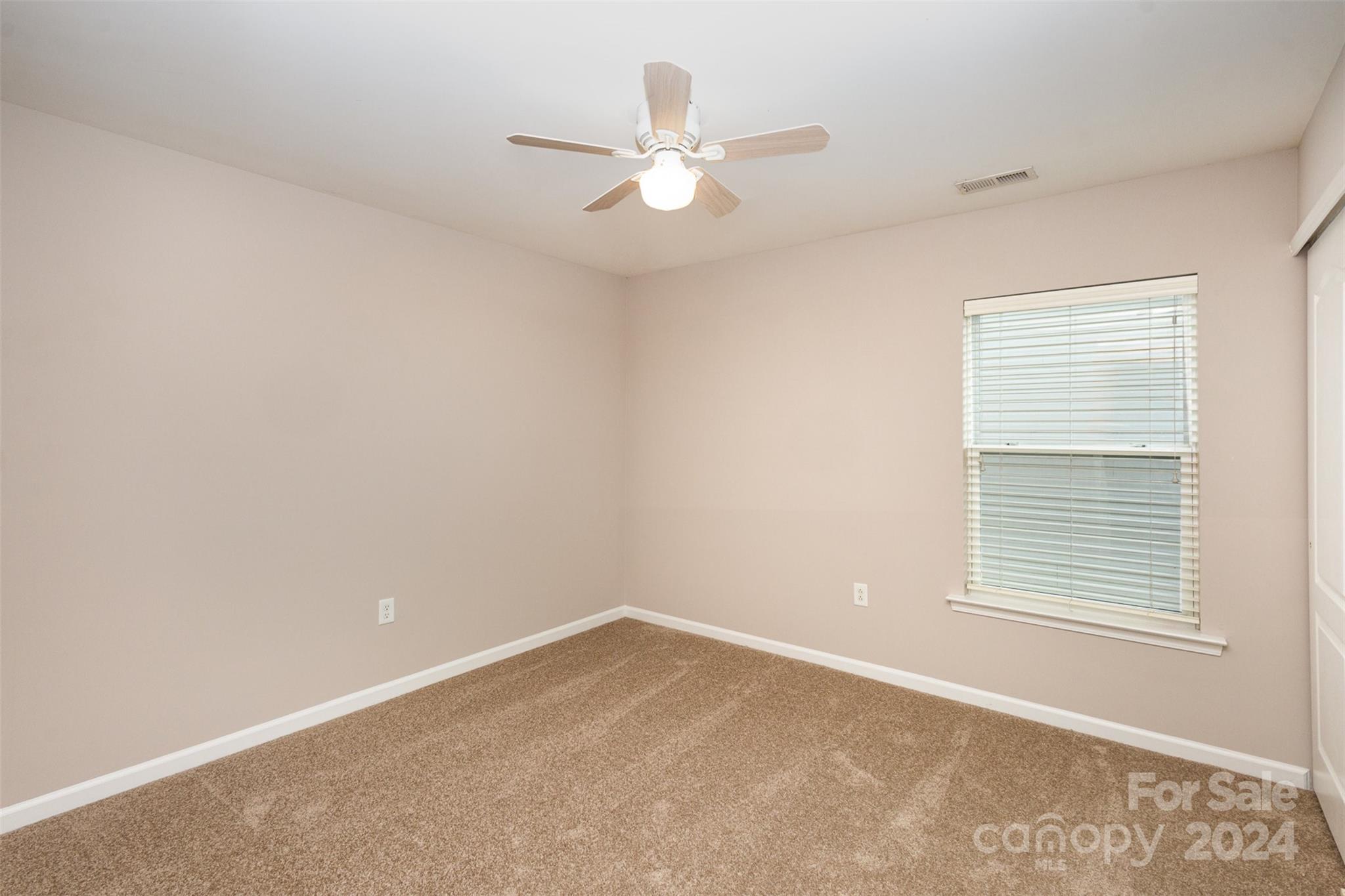 503 Waterlemon Way Monroe, NC 28110 - Photo 13 of 22 a view of an empty room with a window
