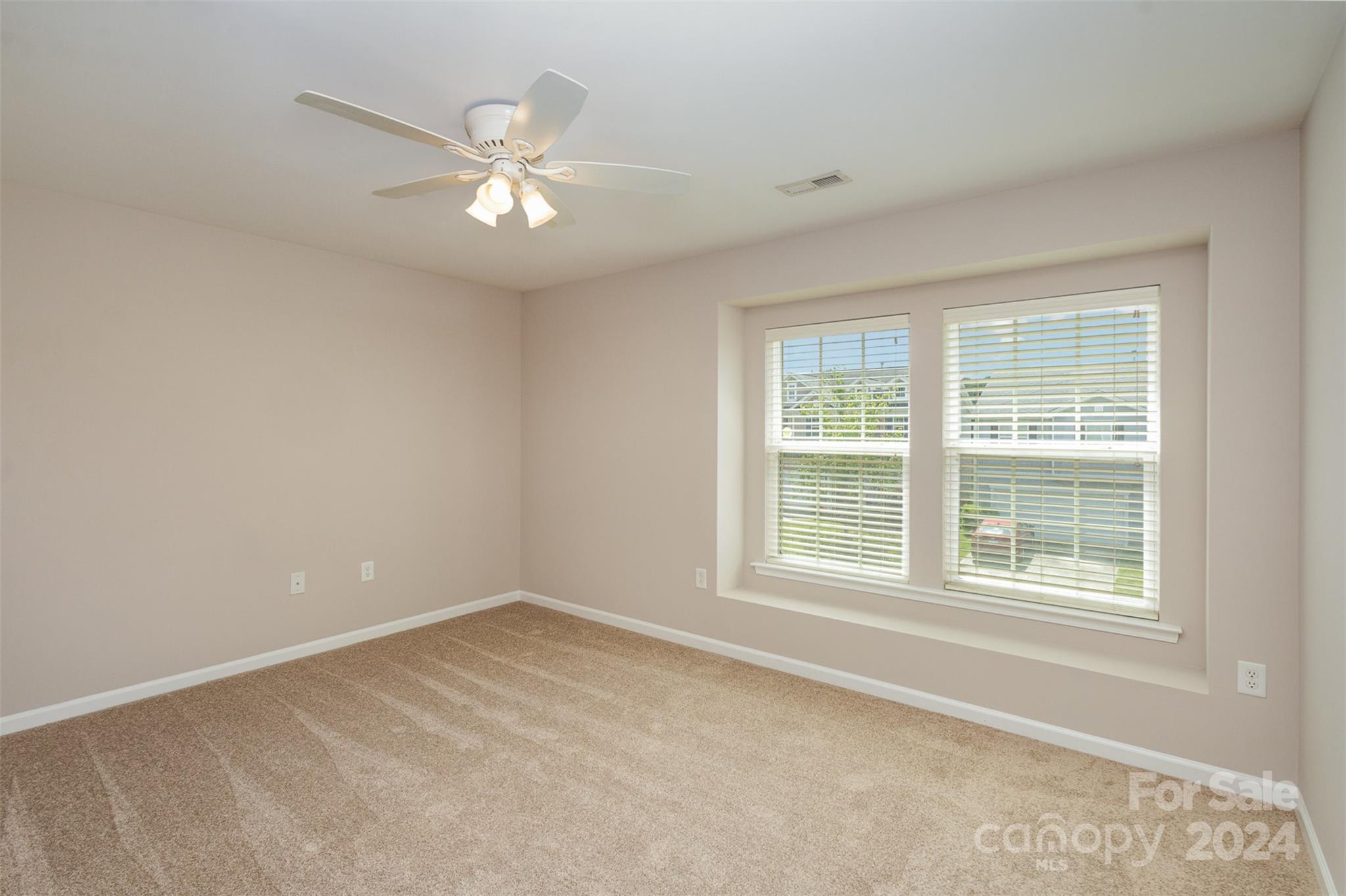503 Waterlemon Way Monroe, NC 28110 - Photo 14 of 22 a view of an empty room with a window