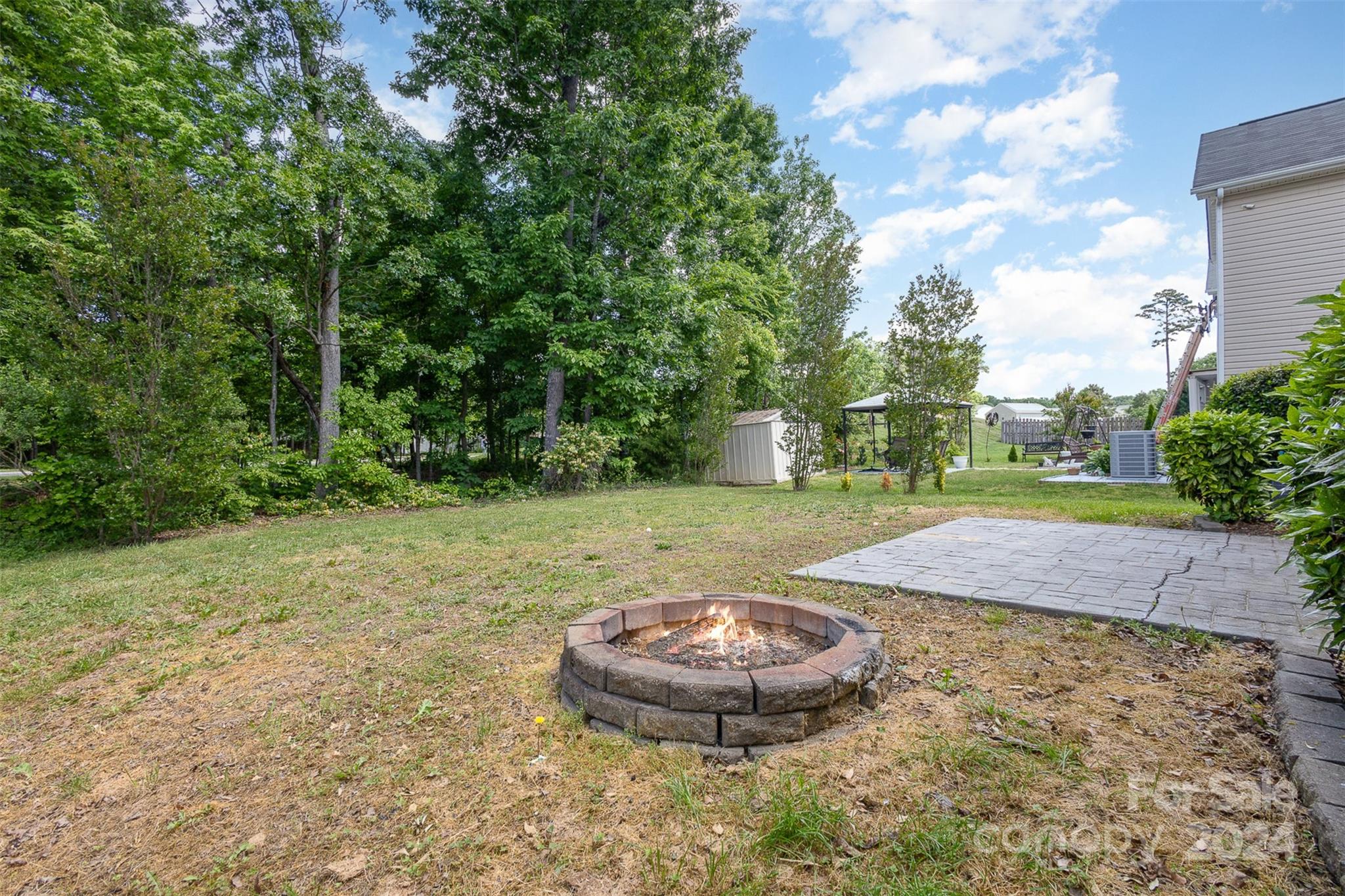 503 Waterlemon Way Monroe, NC 28110 - Photo 18 of 22 a view of a backyard with a barn