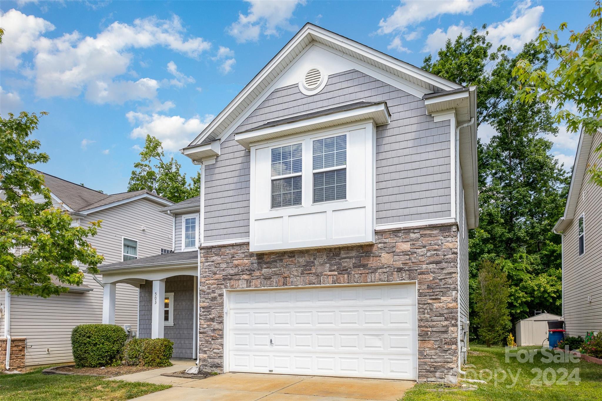 503 Waterlemon Way Monroe, NC 28110 - Photo 2 of 22 a front view of a house with a garden
