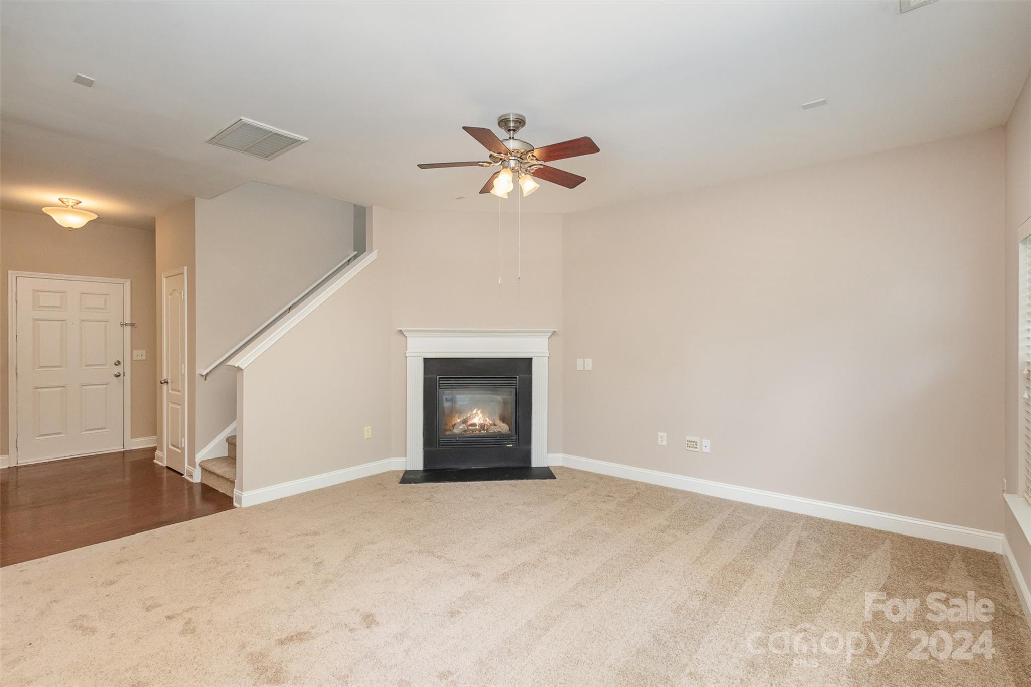 503 Waterlemon Way Monroe, NC 28110 - Photo 3 of 22 a view of an empty room with a ceiling fan