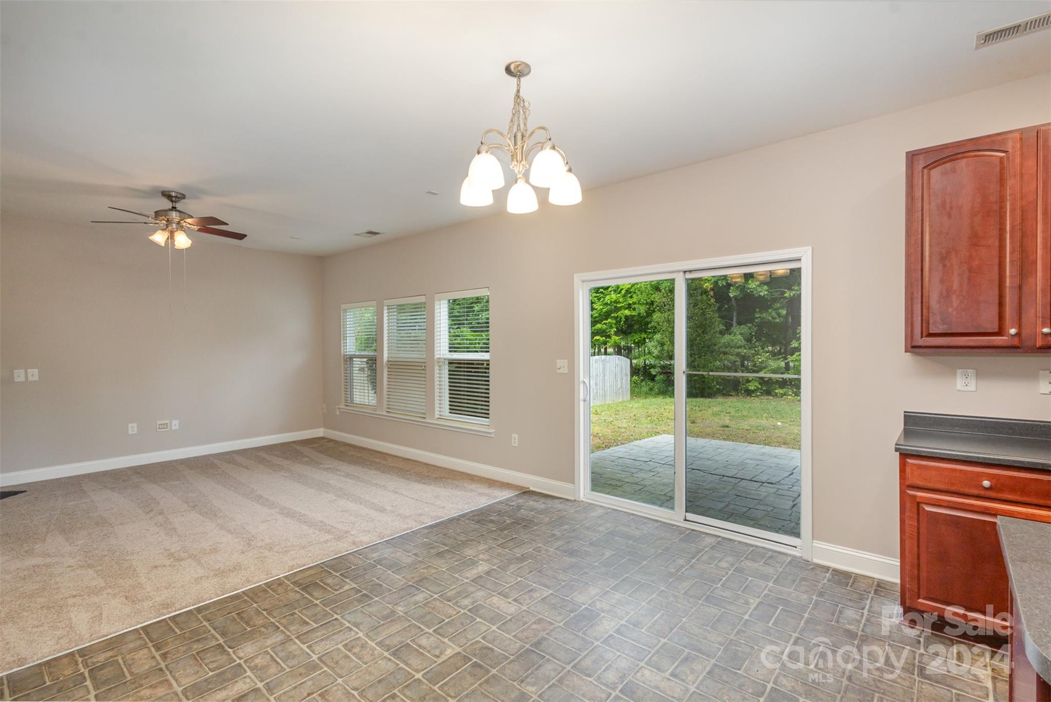 503 Waterlemon Way Monroe, NC 28110 - Photo 5 of 22 a view of an empty room with a window