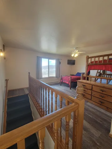 a bathroom with a sink double vanity granite and a mirror