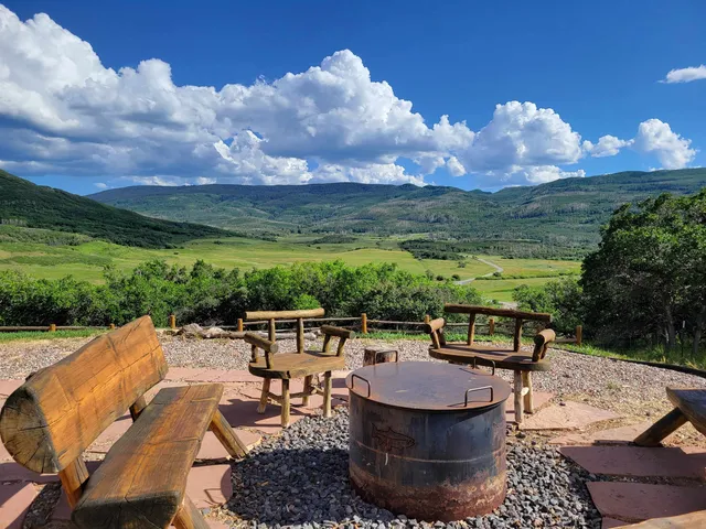 a view of a terrace with furniture