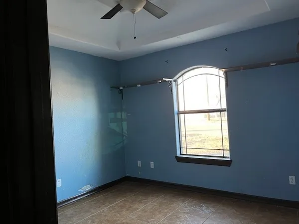 an empty room with windows