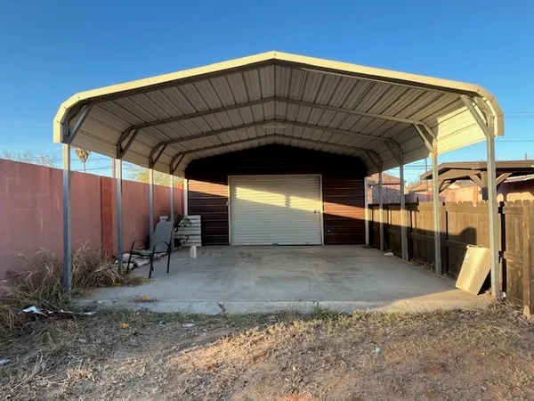 a living room with projector and furniture