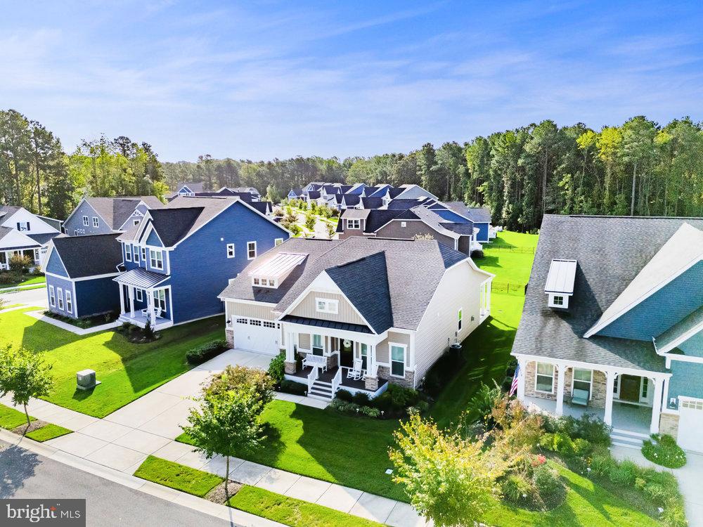 an aerial view of a house with a garden