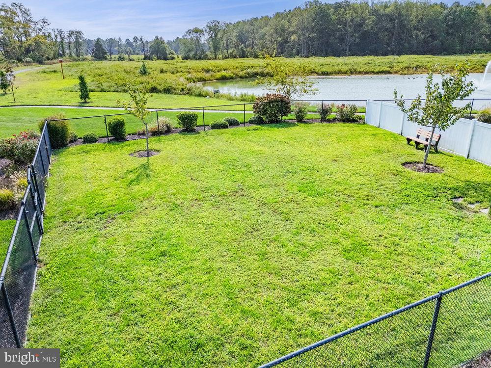 33415 Bridgehampton Lane Lewes, DE 19958 - Photo 57 of 66 a view of an outdoor space and a yard
