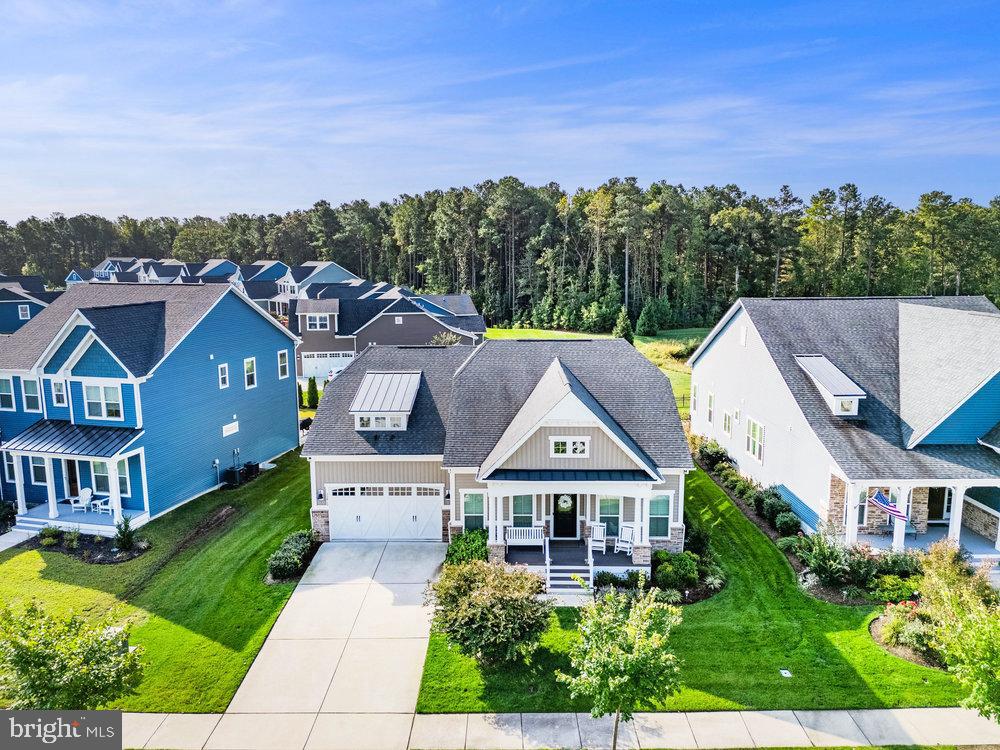 33415 Bridgehampton Lane Lewes, DE 19958 - Photo 66 of 66 an aerial view of multiple houses