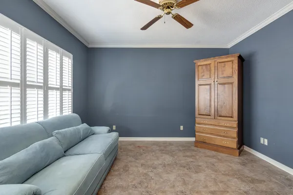 a living room with furniture and window