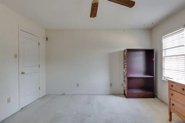 wooden floor and window in a room
