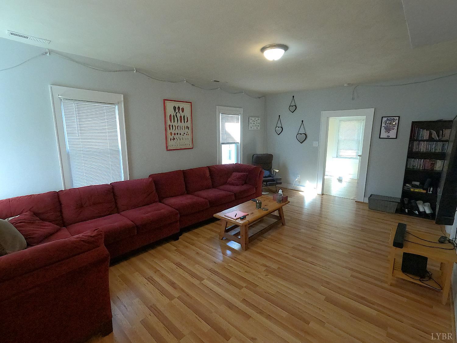 932 Bedford Road Vinton, VA 24179 - Photo 3 of 12 a living room with furniture and a flat screen tv