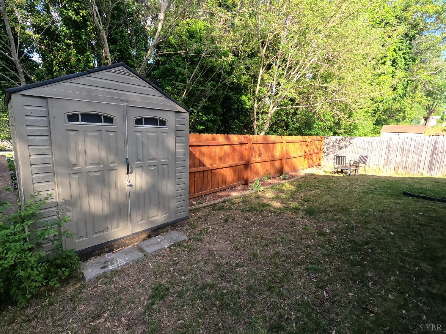932 Bedford Road Vinton, VA 24179 - Photo 10 of 12 a backyard of a house with lots of green space