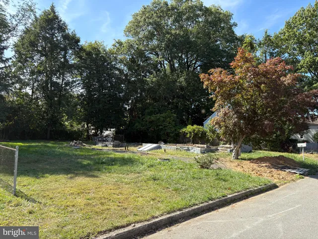 a bathroom with a stove and a shower