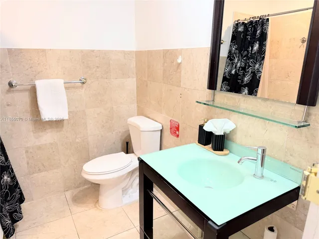 a bathroom with a sink and a toilet