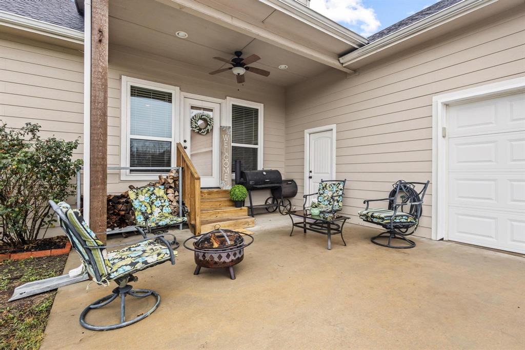 293 Redden Road Van Alstyne, TX 75495 - Photo 1 of 40 a view of a livingroom with furniture and a ceiling fan