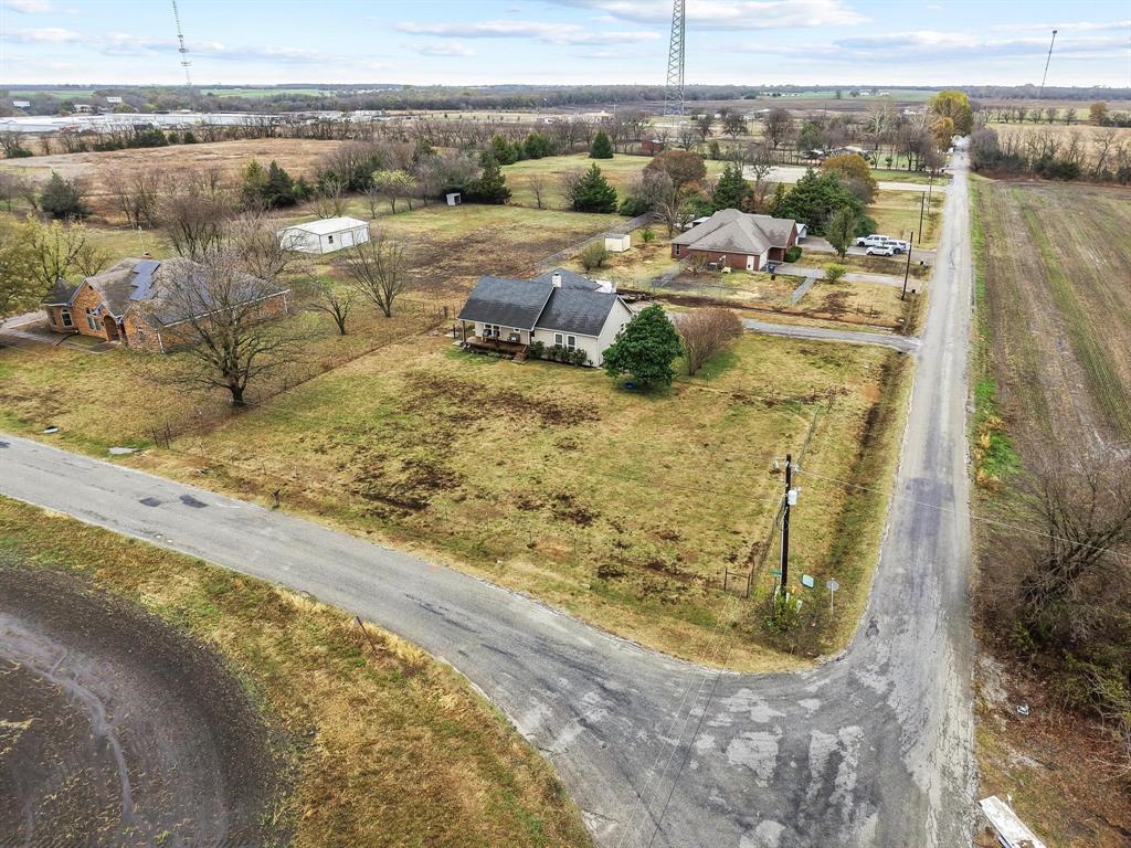 293 Redden Road Van Alstyne, TX 75495 - Photo 37 of 40 a view of a lake with a mountain