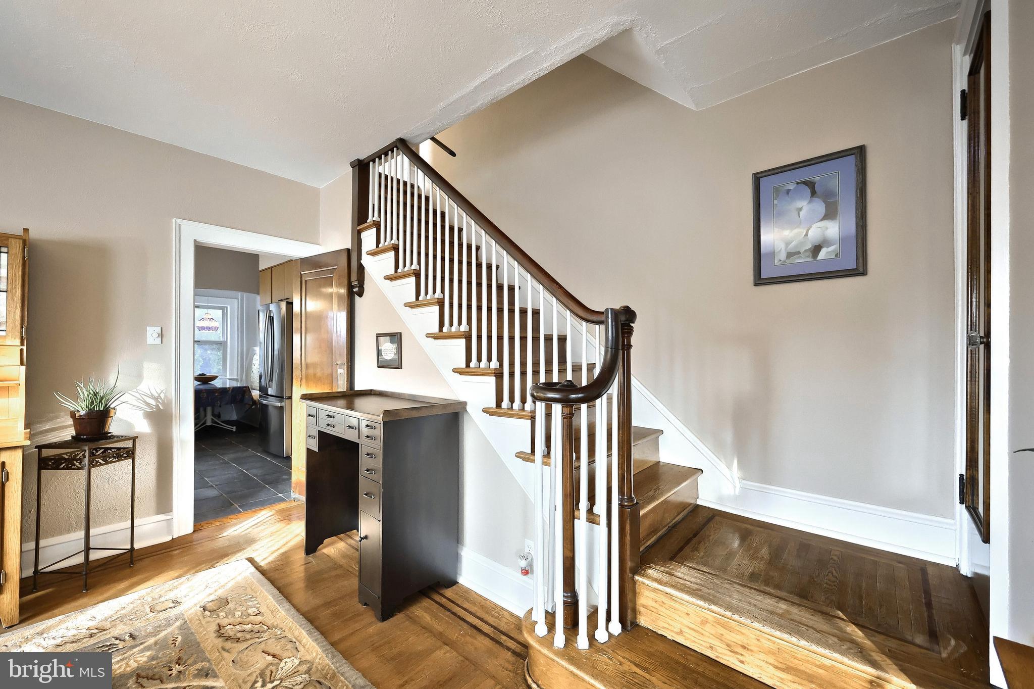 1501 3rd Avenue York, PA 17403 - Photo 14 of 40 a view of entryway livingroom and hall with wooden floor