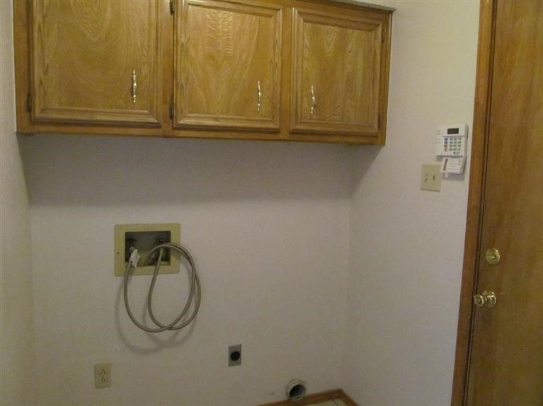 6018 73rd Street Lubbock, TX 79424 - Photo 8 of 10 a bathroom with a sink and mirror