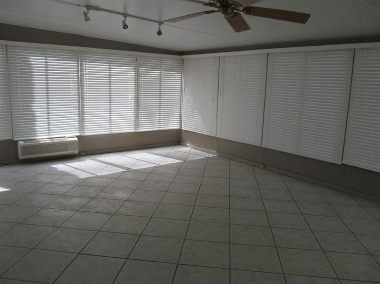 6018 73rd Street Lubbock, TX 79424 - Photo 9 of 10 a view of an empty room with a window