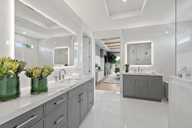 a bathroom with a shower and a sink