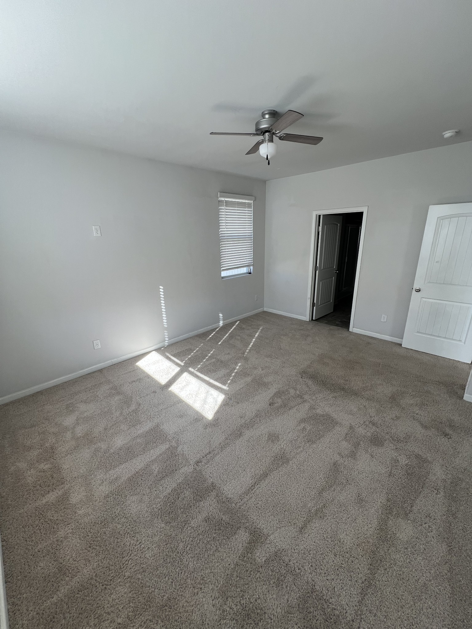 231 Tessa Grace Way Murfreesboro, TN 37129 - Photo 11 of 34 a view of a big room with windows and ceiling fan