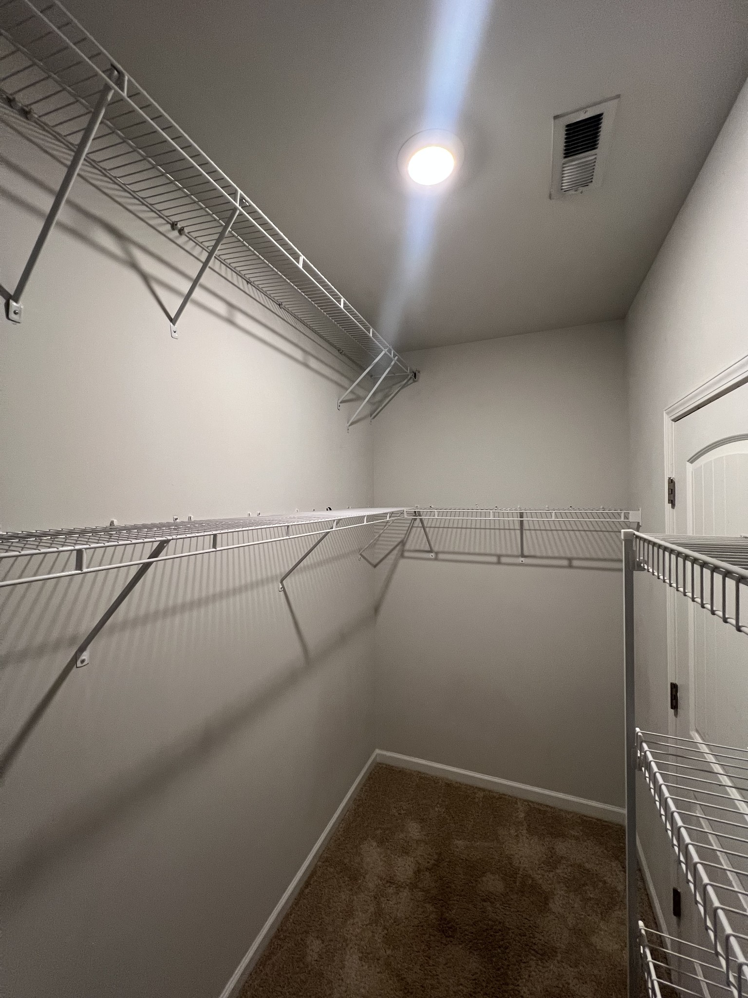 231 Tessa Grace Way Murfreesboro, TN 37129 - Photo 17 of 34 a view of a room with racks on the wall