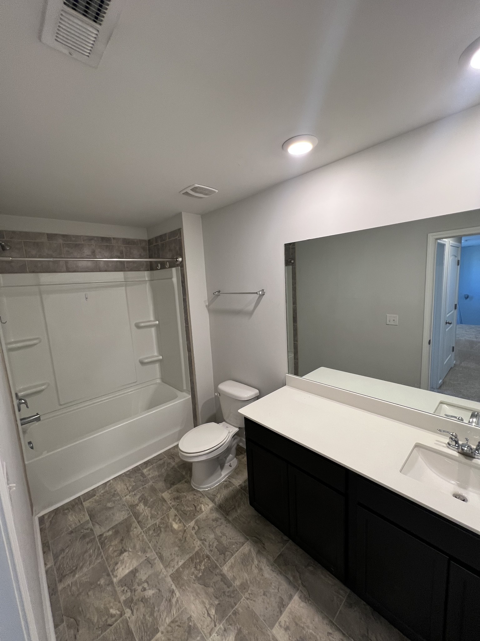 231 Tessa Grace Way Murfreesboro, TN 37129 - Photo 31 of 34 a bathroom with a sink a toilet and shower