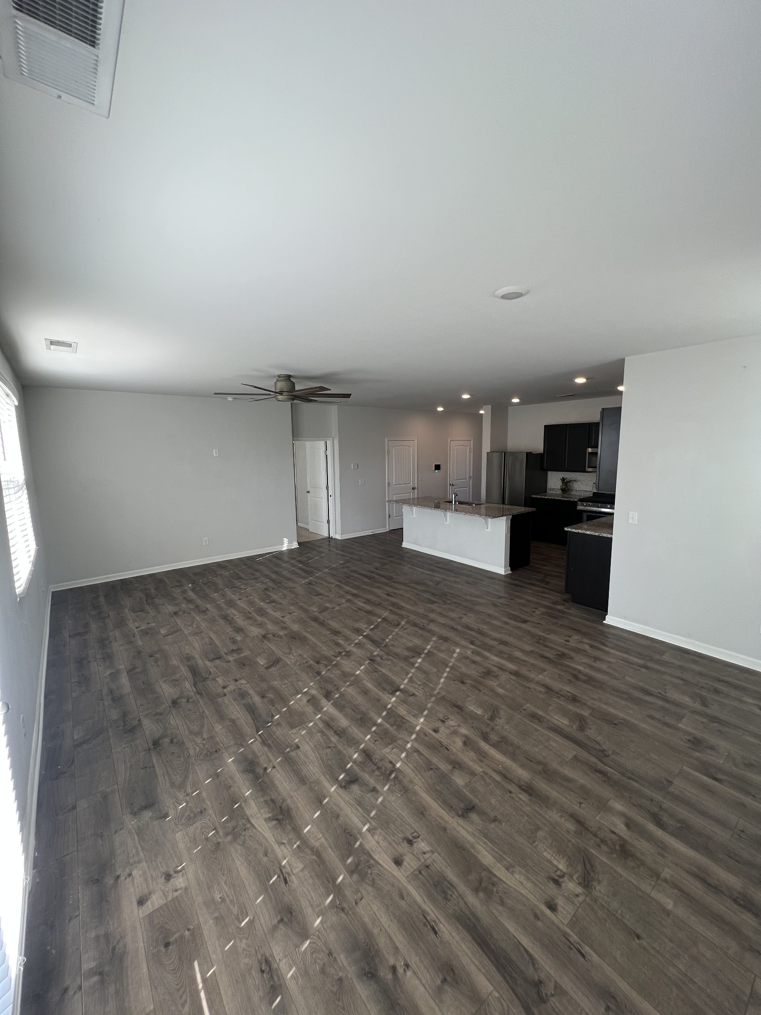 231 Tessa Grace Way Murfreesboro, TN 37129 - Photo 9 of 34 a view of empty room with wooden floor