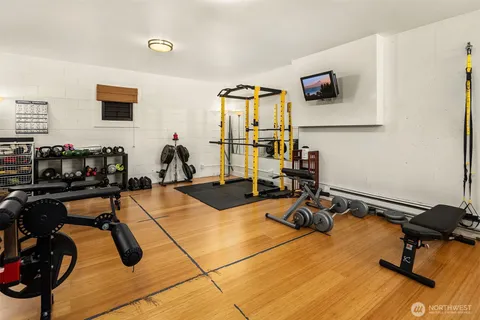 a view of a livingroom with workspace and a couch