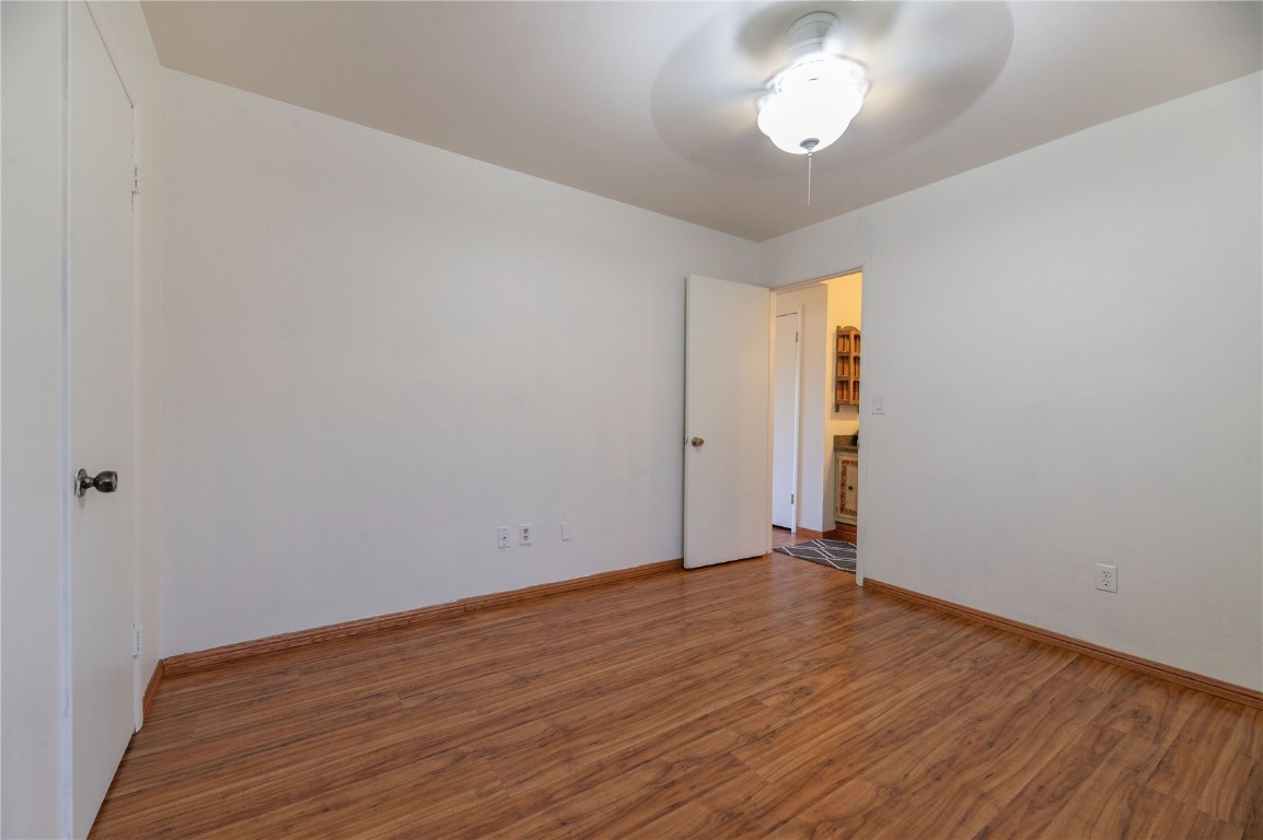 110 Evergreen Road, Unit 102 Dillon, CO 80435 - Photo 11 of 30 a view of an empty room with wooden floor and a window