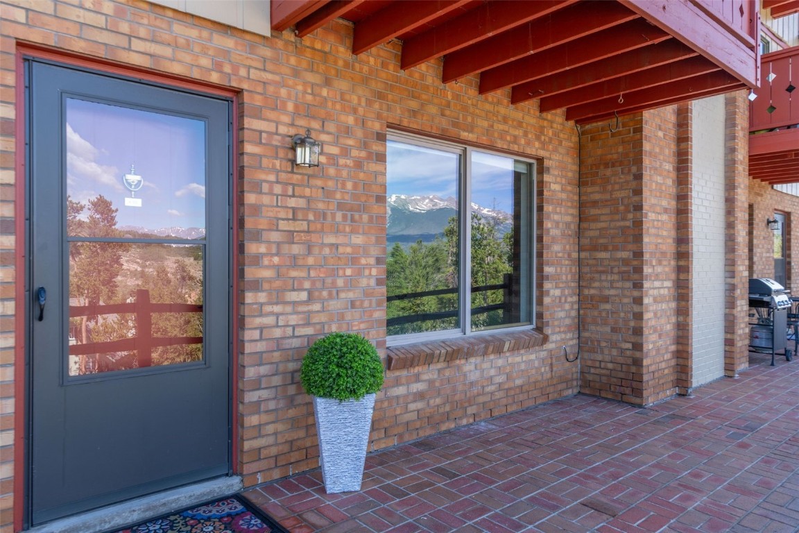 110 Evergreen Road, Unit 102 Dillon, CO 80435 - Photo 15 of 30 a front view of a house with garden