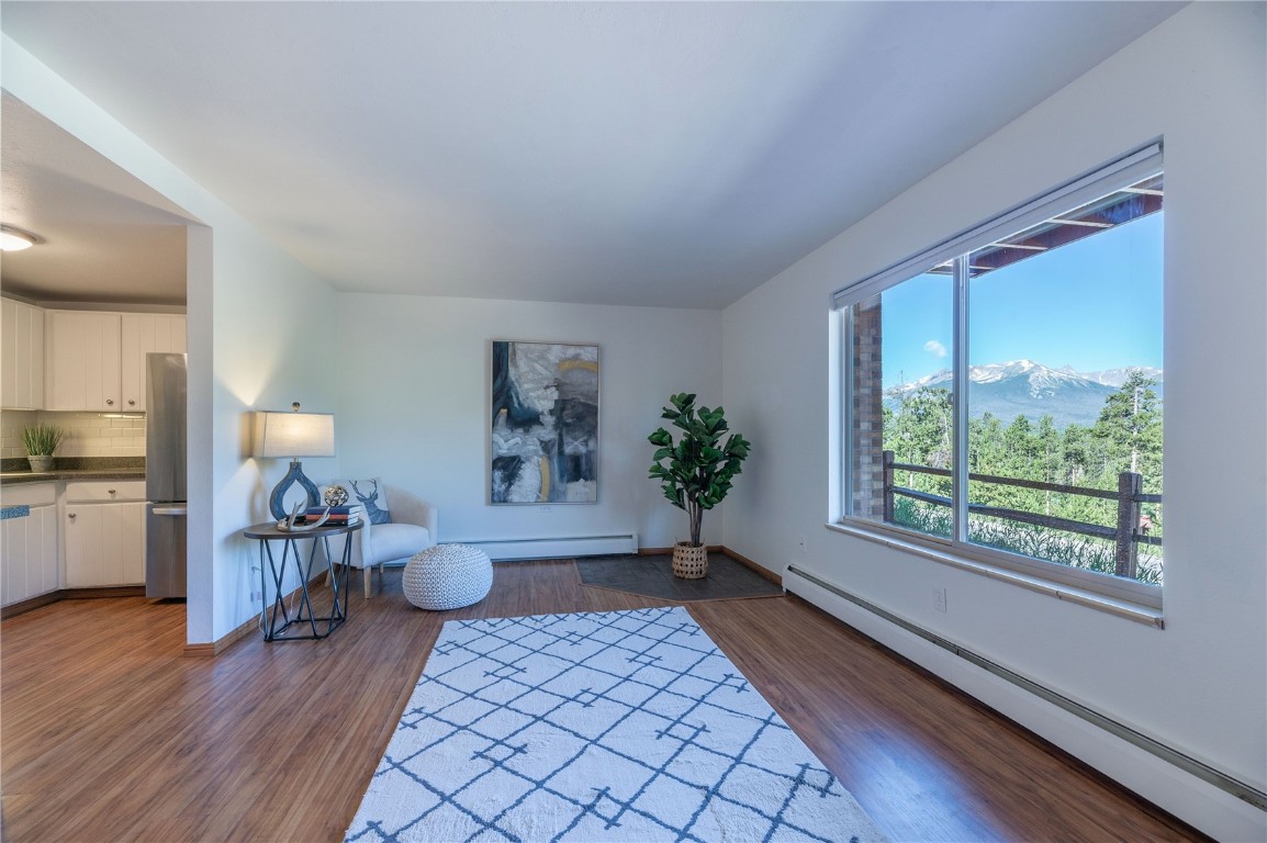 110 Evergreen Road, Unit 102 Dillon, CO 80435 - Photo 2 of 30 a living room with furniture and a large window