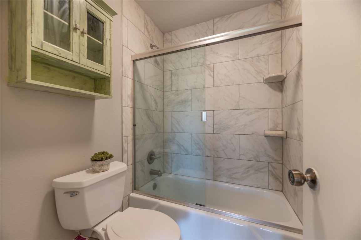 110 Evergreen Road, Unit 102 Dillon, CO 80435 - Photo 8 of 30 a white toilet sitting next to a bath tub