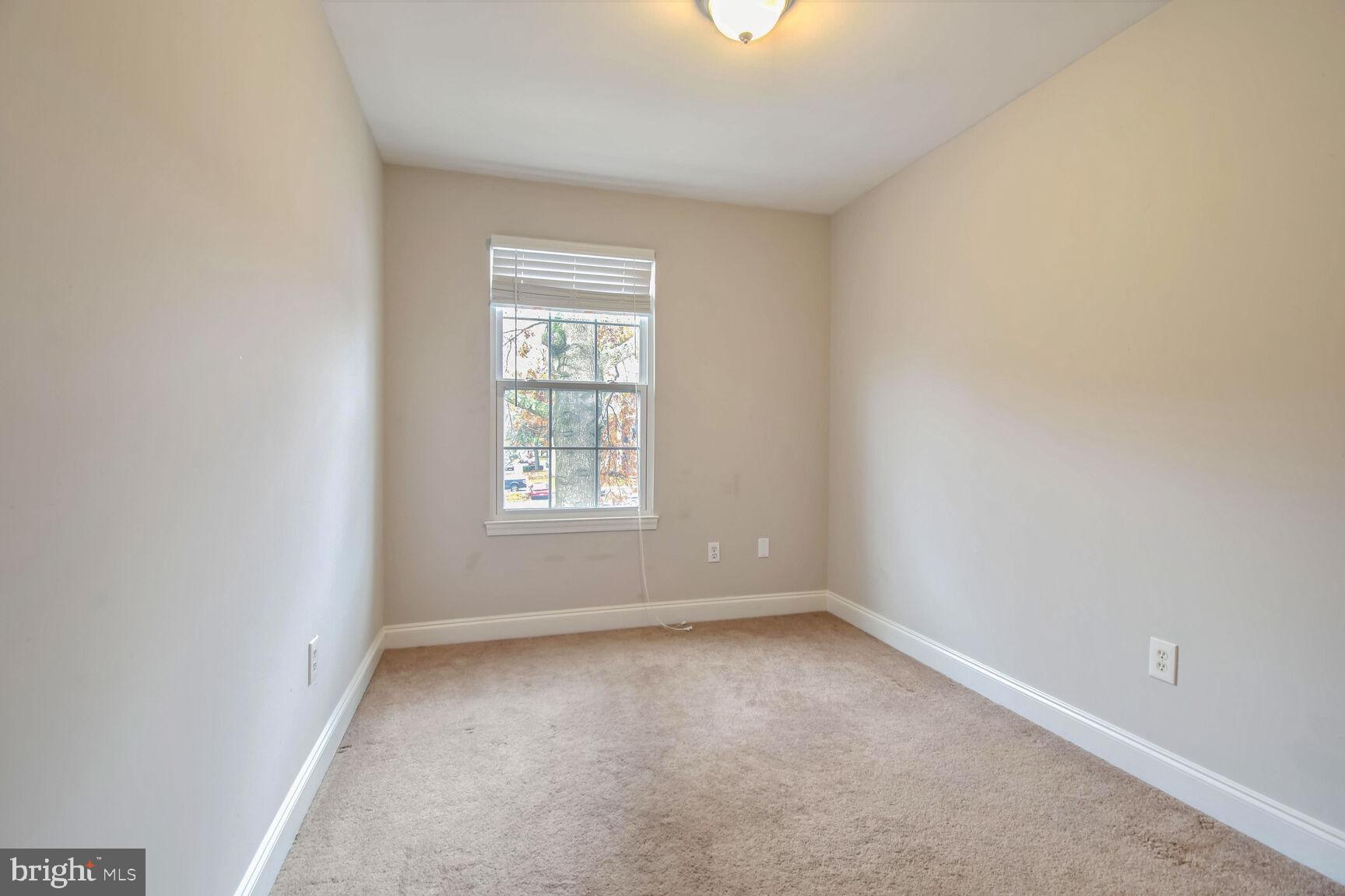 14906 McKisson Court, Unit 8DF Silver Spring, MD 20906 - Photo 13 of 19 Second Bedroom