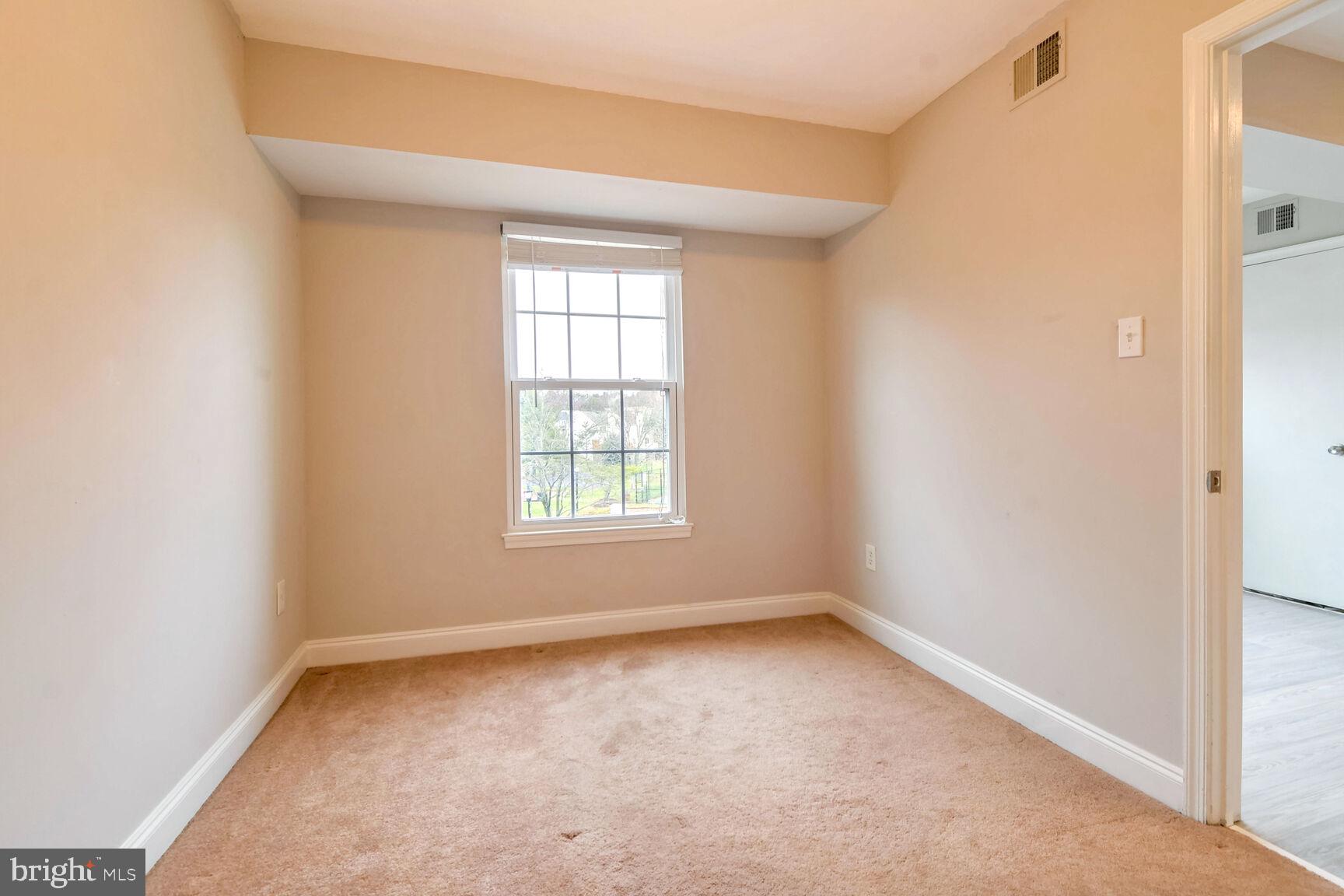 14906 McKisson Court, Unit 8DF Silver Spring, MD 20906 - Photo 10 of 19 First Bedroom