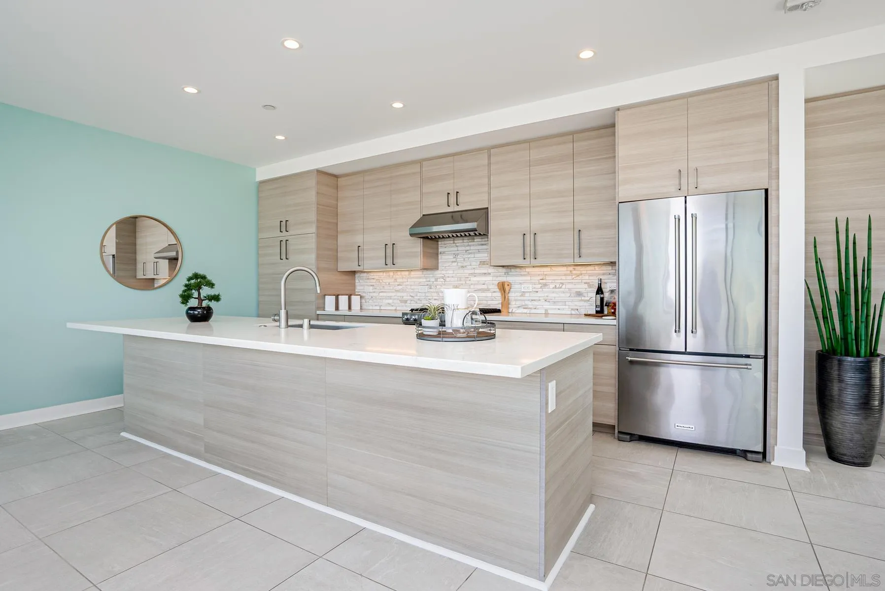 2359 Front Street San Diego, CA 92101 - Photo 13 of 50 a kitchen with stainless steel appliances granite countertop a refrigerator and a sink