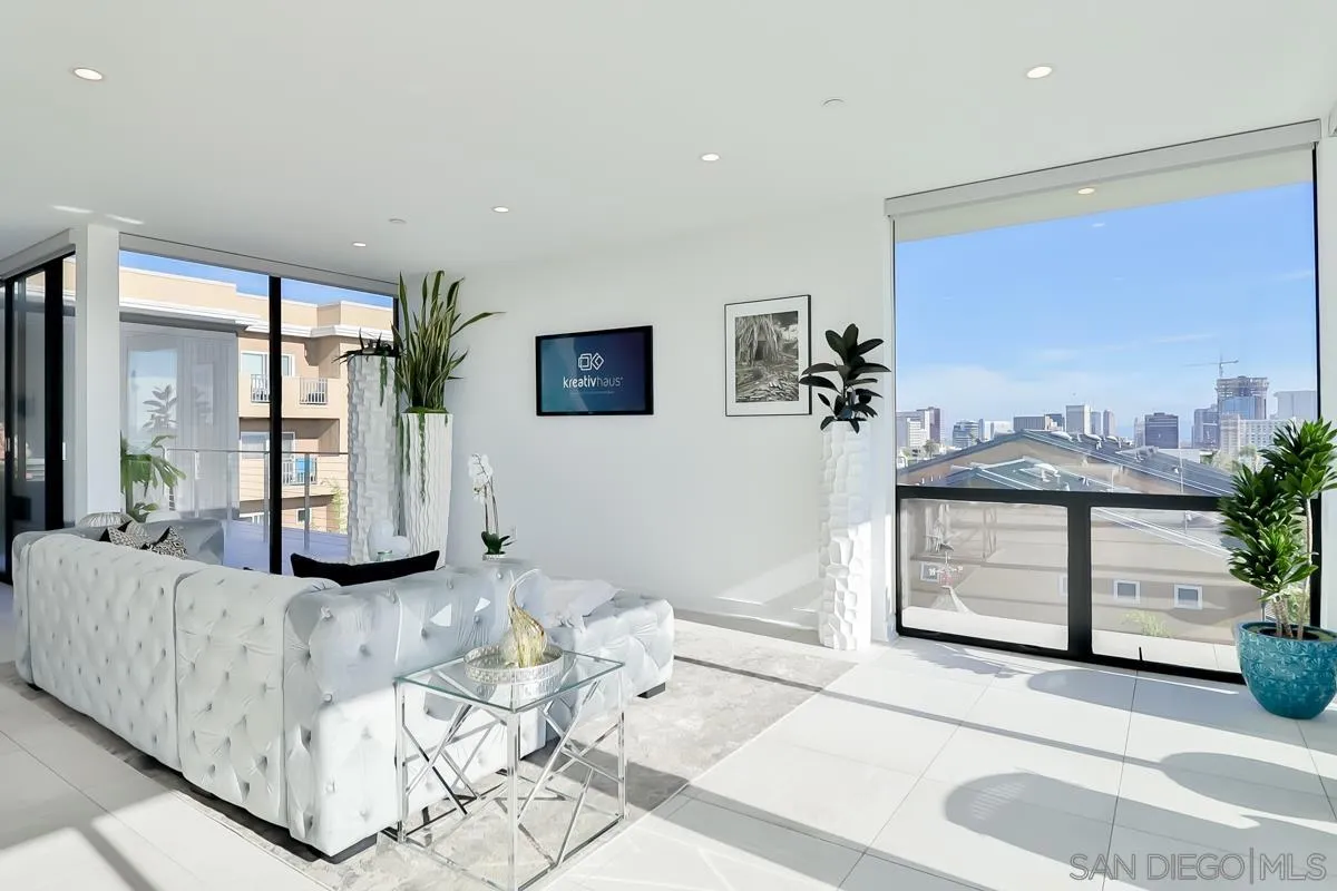 2359 Front Street San Diego, CA 92101 - Photo 23 of 50 a living room with furniture and large mirror