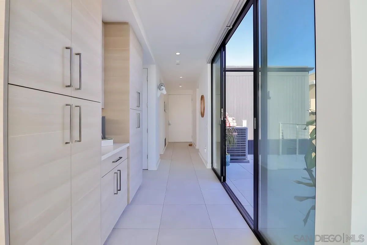 2359 Front Street San Diego, CA 92101 - Photo 25 of 50 a bathroom with a glass shower door