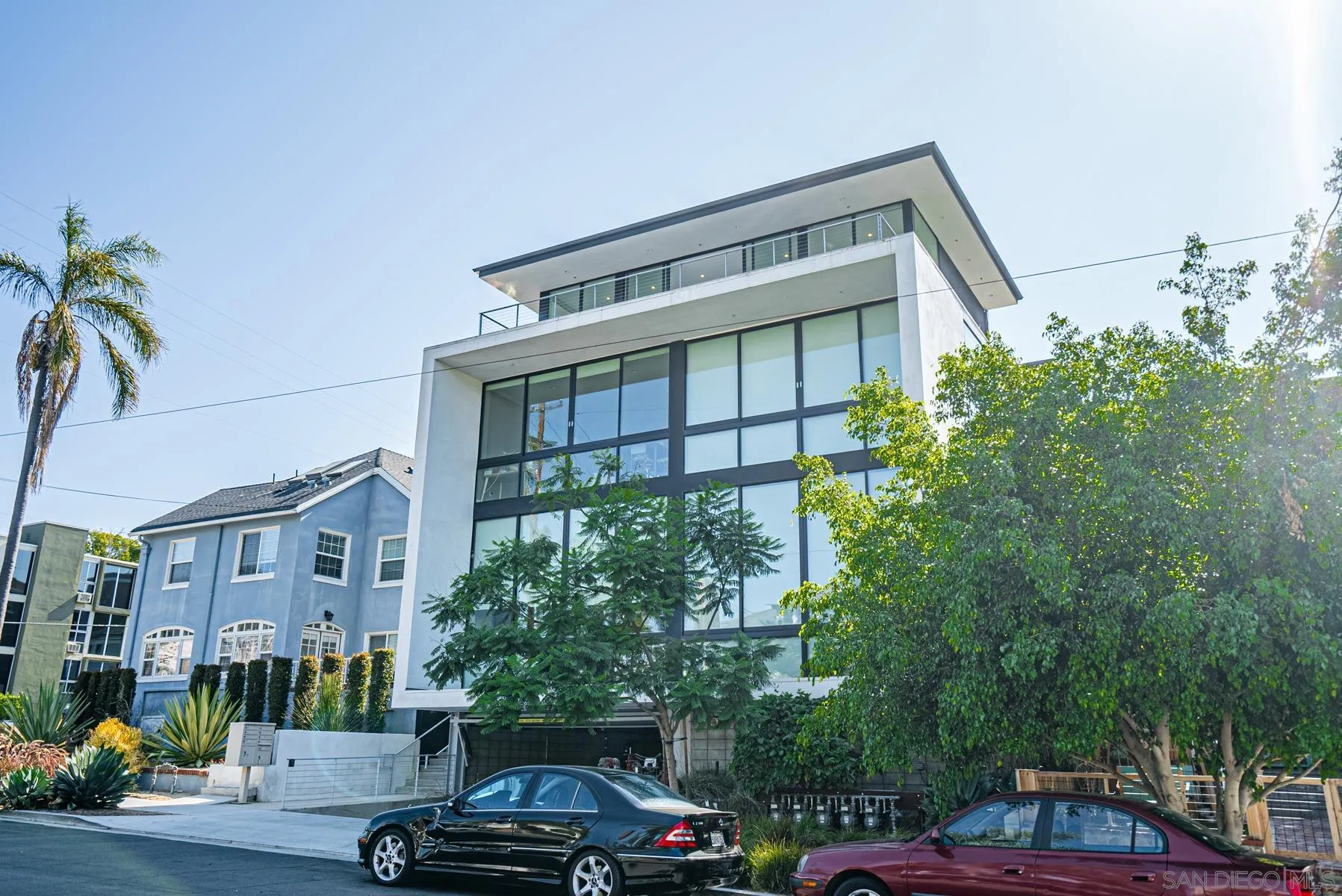 2359 Front Street San Diego, CA 92101 - Photo 3 of 50 a car parked in front of a building