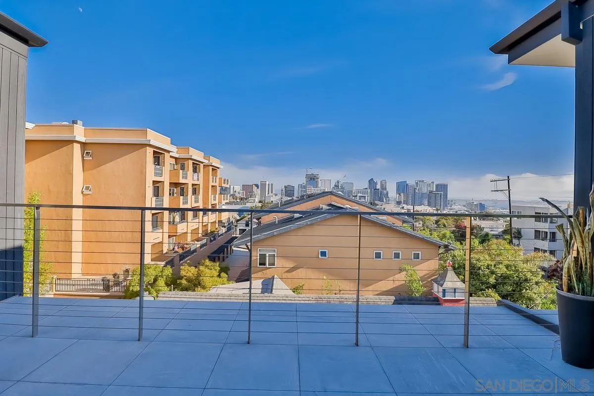 2359 Front Street San Diego, CA 92101 - Photo 40 of 50 a view of a balcony with chair and wooden floor