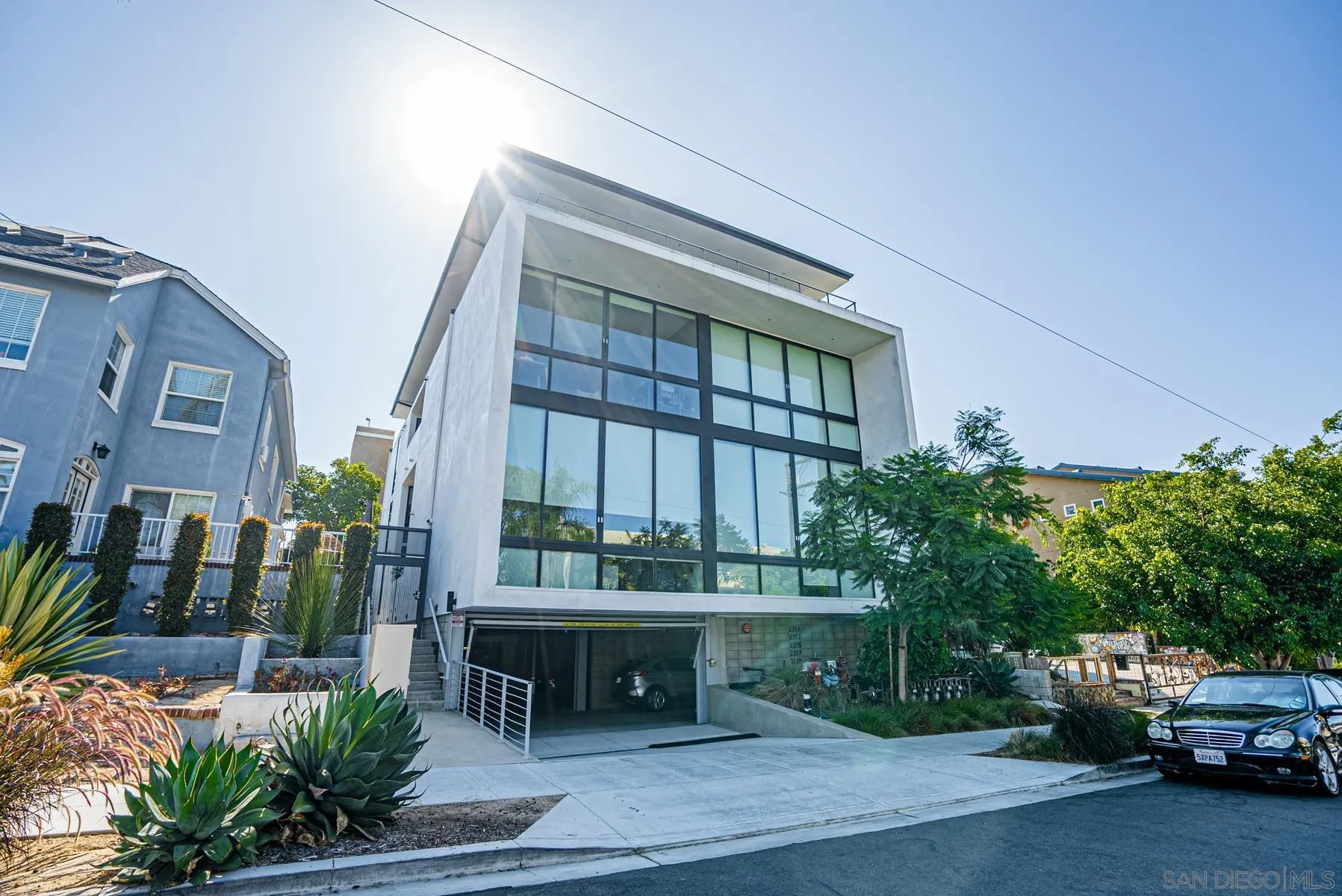 2359 Front Street San Diego, CA 92101 - Photo 46 of 50 a car parked in front of a building