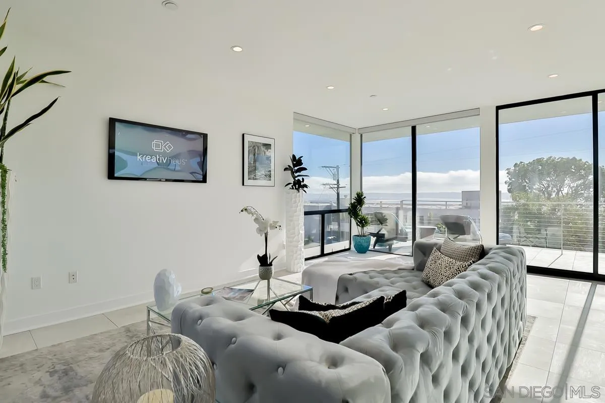 2359 Front Street San Diego, CA 92101 - Photo 10 of 50 a living room with furniture and a large window