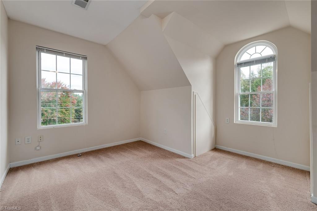 7935 Highfill Road Summerfield, NC 27358 - Photo 22 of 27 This is the second upstairs bonus room adjacent to the office. It is filled with natural sunlight in the mornings!