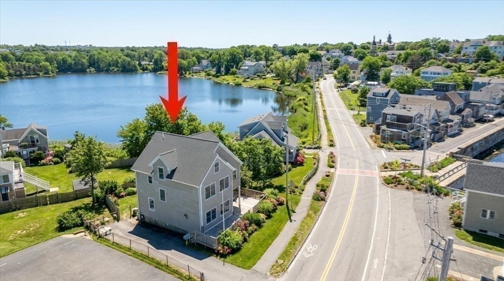181 Atlantic Avenue Hull, MA 02045 - Photo 30 of 30 an aerial view of a house with outdoor space and a lake view