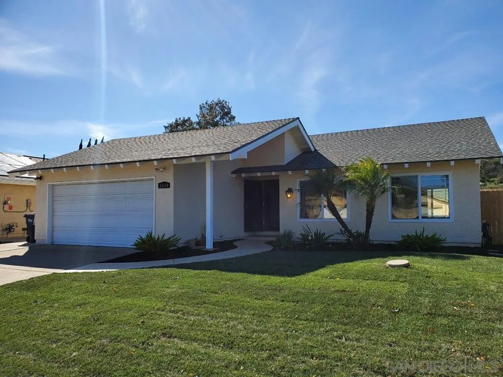 13130 Tobiasson Road Poway, CA 92064 - Photo 3 of 24 a front view of a house with a yard