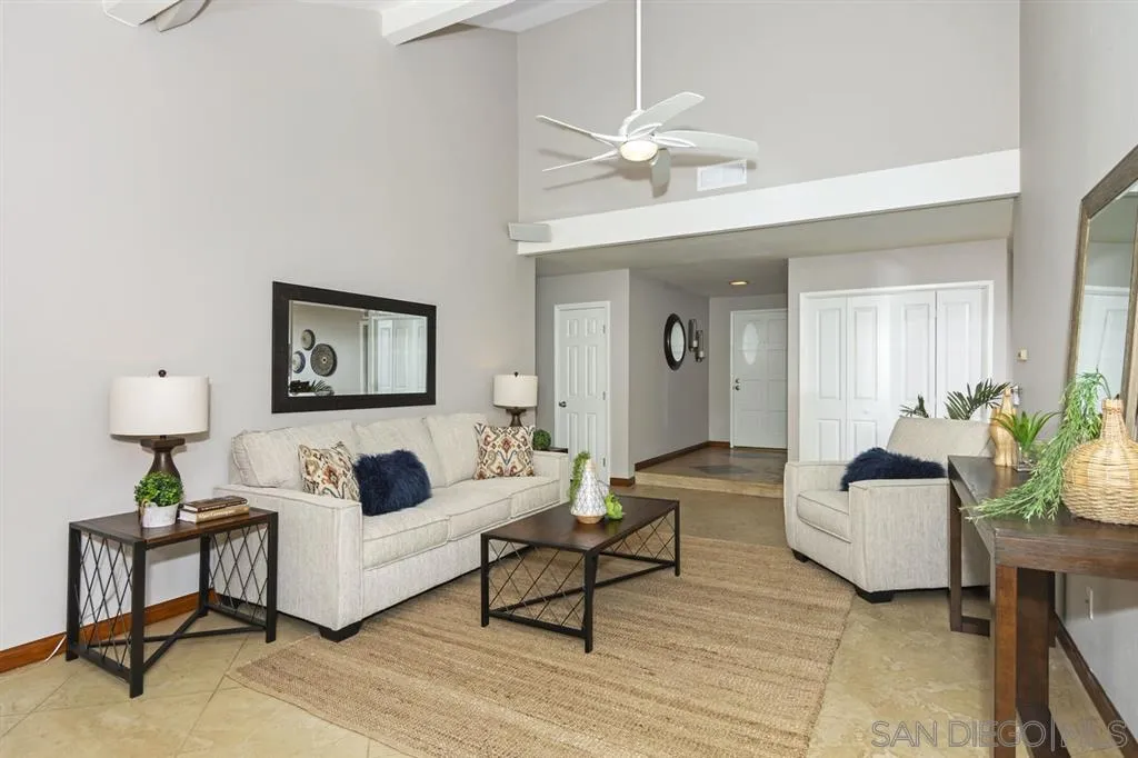 13130 Tobiasson Road Poway, CA 92064 - Photo 5 of 24 a living room with furniture and a lamp