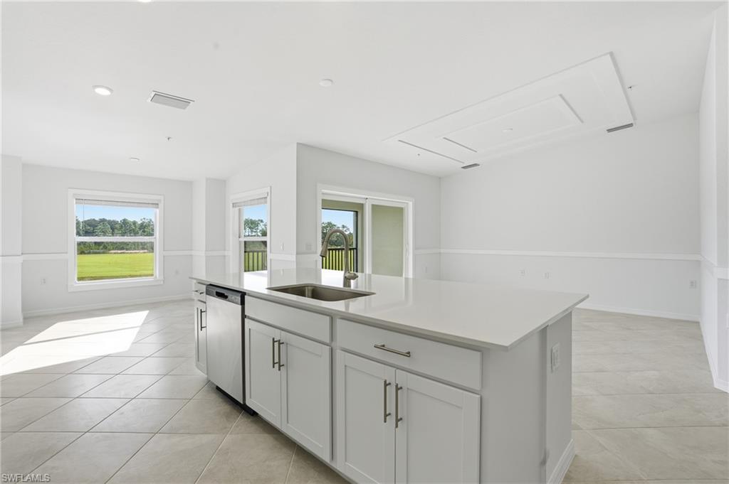 15185 Bluffton Lane, Unit 826 Punta Gorda, FL 33982 - Photo 18 of 50 a spacious bathroom with a sink and a bathtub