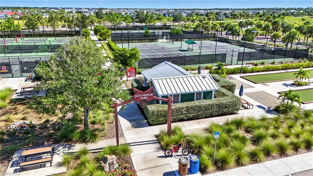 15185 Bluffton Lane, Unit 826 Punta Gorda, FL 33982 - Photo 46 of 50 a view of a garden with sitting area
