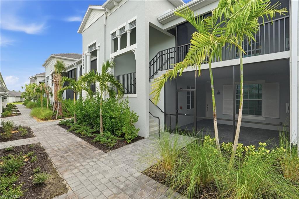15185 Bluffton Lane, Unit 826 Punta Gorda, FL 33982 - Photo 7 of 50 a house with a plant in front of it